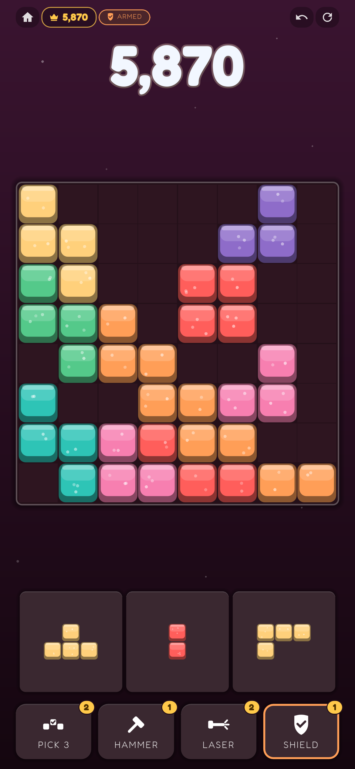 Grid Fill gameplay — the 8×8 board with the piece tray and power bar below it